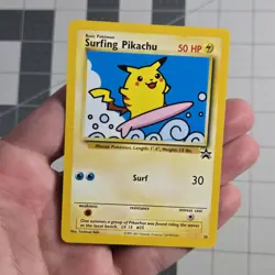 Surfing Pikachu Black Star Promo 28 WOTC Pokemon Card - Image 1