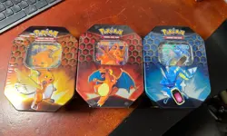 Pokemon Hidden Fates Tins (Set of 3 Tins) - Charizard, Raichu, Gyarados Art Set - Image 1