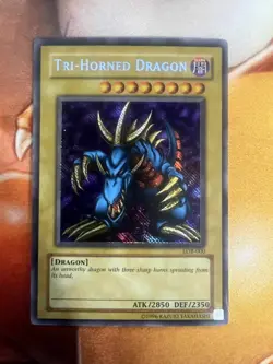 Tri-Horned Dragon LOB-000 English Secret Rare Light Play Yugioh TCG - Image 1