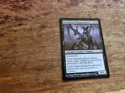 Sheoldred, Whispering One New Phyrexia Regular - Image 1