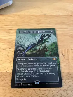 Sword of Feast and Famine (Borderless) Double Masters Regular Foil - Image 1