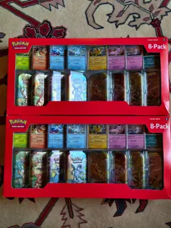 Pokemon Prismatic Evolutions 8-Pack Mini Tins (2 Packs) Costco - Image 1