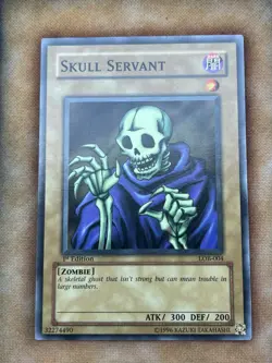 YuGiOh 1st Ed Skull Servant LOB-004 NM Pack Fresh Wavy Original Copy - Image 1