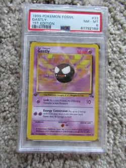 1999 POKEMON FOSSIL #33 GASTLY PSA 8 FIRST EDITION - Image 1