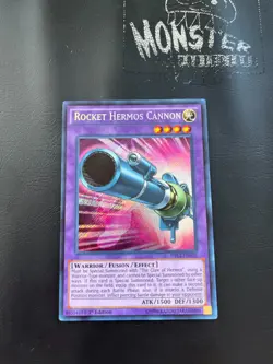 YUGIOH ROCKET HERMOS CANNON SECRET RARE DRL2-EN010 1ST EDITION - Image 1