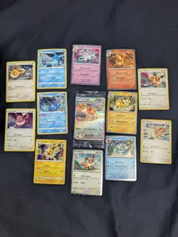 Pokemon Tcg Eevee Black Star Promo Lot, Sealed, Prismatic, Lot Of 13 Cards - Image 1