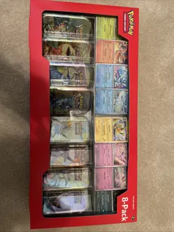 Pokemon TCG Prismatic Evolutions Mini Tin Display Case Sealed Tins, 8-Pack - Image 1
