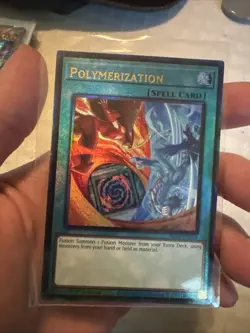 YuGiOh - Polymerization (Alt Art) RA03-EN051 - Prismatic Ultimate Rare - Image 1