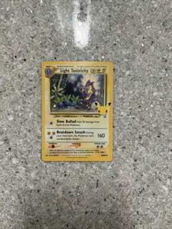 Light Toxtricity SWSH137 Pokemon Celebrations 25th Anniversary Black Star Promo - Image 1