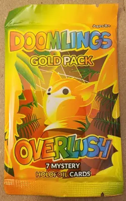 Doomlings GOLD PACK Overlush Pack - 7 Mystery Holofoil Cards Unopened Sealed - Image 1