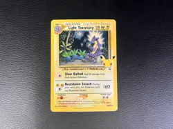 Light Toxtricity Celebrations SWSH Pokemon Card NM - Image 1