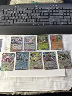 Pokemon Surging Sparks EX 9 Card Lot - Image 1