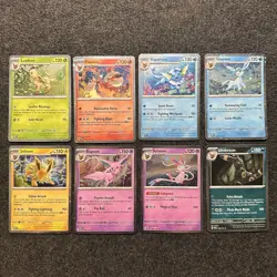 Pokemon Prismatic Evolutions Costco Mini Tin Cosmo Promos (8) Umbreon Sylveon - Image 1