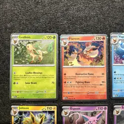 Pokemon Prismatic Evolutions Costco Mini Tin Cosmo Promos (8) Umbreon Sylveon - Image 2