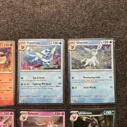 Pokemon Prismatic Evolutions Costco Mini Tin Cosmo Promos (8) Umbreon Sylveon - Image 3