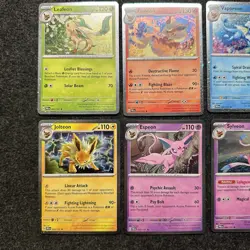 Pokemon Prismatic Evolutions Costco Mini Tin Cosmo Promos (8) Umbreon Sylveon - Image 4