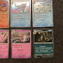 Pokemon Prismatic Evolutions Costco Mini Tin Cosmo Promos (8) Umbreon Sylveon - Image 5