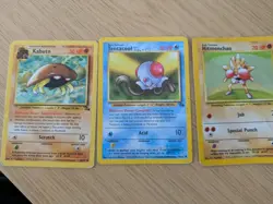 Damaged/HP 1999 Pokemon Cards. Holo Hitmonchan. Fossil Tentacool and Kabuto - Image 1