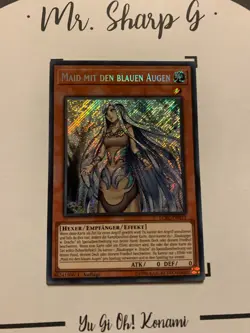 MAID MIT DEN BLAUEN AUGEN - 1. AUFLAGE LCKC-DE012 DE Yu Gi Oh! CARD SECRET RARE - Image 2
