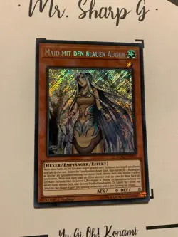 MAID MIT DEN BLAUEN AUGEN - 1. AUFLAGE LCKC-DE012 DE Yu Gi Oh! CARD SECRET RARE - Image 3