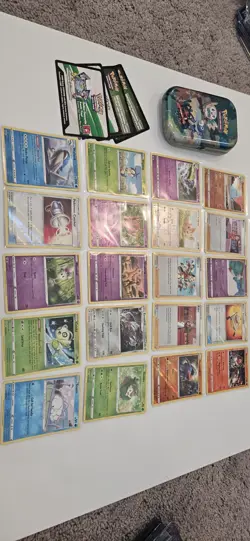 Authentic Pokemon TCG 20 Assorted Reverse Holo Card Lot Tin And Codes - Image 1