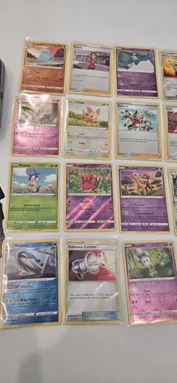 Authentic Pokemon TCG 20 Assorted Reverse Holo Card Lot Tin And Codes - Image 3