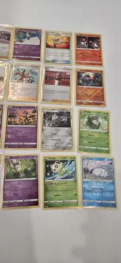 Authentic Pokemon TCG 20 Assorted Reverse Holo Card Lot Tin And Codes - Image 4
