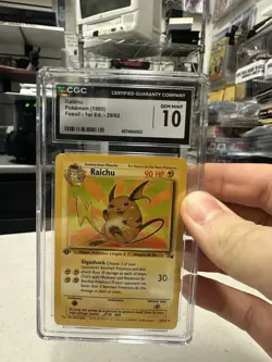 [CGC 10 GEM MINT] Raichu 1st Edition Fossil 14/62 1999 Pokemon TCG (1999) - Image 1