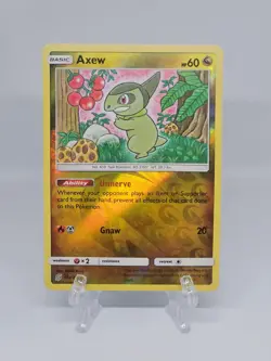 154/236 AXEW | COMMON REVERSE HOLO | UNIFIED MINDS POKEMON CARD - Image 1