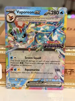 Pokemon TCG Prismatic Evolutions Vaporeon EX 023/131 Surprise Box Promo Stamp - Image 1