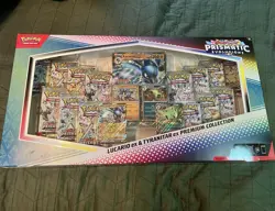 Pokemon TCG - Prismatic Evolutions Lucario ex & Tyranitar ex Premium Collection - Image 1