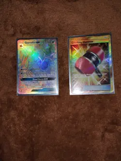 2 Pokemon cards || Gold Crushing Hammer Trainer || Gyarados GX Rainbow - Image 1