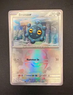 Bronzor 66/131 NM Prismatic Evolution Master Ball Reverse Holo Pokemon Card TCG - Image 1