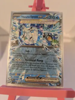027/131 Wellspring Mask Ogerpon EX Prismatic Evolutions Pokemon - Image 1