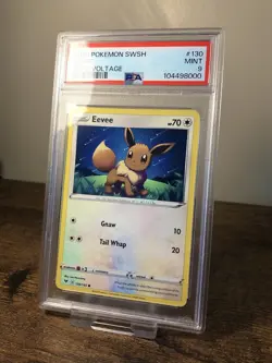 PSA 9 Eevee 130/185 Sword Shield Vivid Voltage Pokemon Card Mint - Image 1