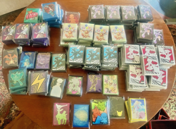 *HUGE LOT* Pokemon TCG ETB Card Sleeves SEALED 130+ Packs - Bulk Deal - Image 1