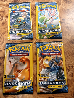 Pokemon Unbroken Bonds 3 Card Booster Packs Factory Sealed Artset (4 packs) - Image 1