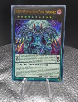 YuGiOh D/D/D DEVISER KING DEUS MACHINEX | BACH-EN044 Ultra Rare NM - Image 1