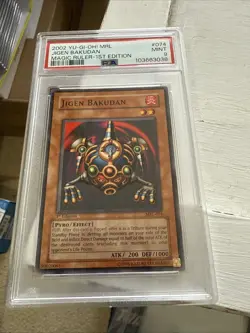PSA 9 2002 Yu-Gi-Oh! MRL Magic Ruler 1st Edition 074 Jigen Bakudan - Image 1