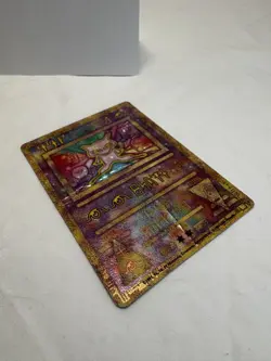 Ancient Mew Pokemon Card - HEAVY DAMAGE WITH FOLDS - Image 1
