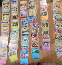 Lot Of 192 Pokemon Cards from Surging Sparks - Image 1