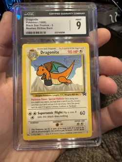1999 Pokemon Dragonite Black Star Movie Promo 5 CGC 9 - Image 1