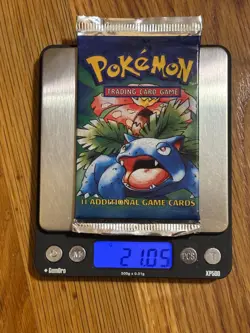 Heavy Pokemon Base Set Factory Sealed Booster Pack 21.05 Grams Auction - Image 1