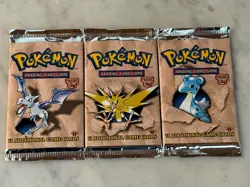 Pokemon 1999 Fossil 1st Edition Booster Pack Artydactel Zapdos & Lapras Set of 3 - Image 1