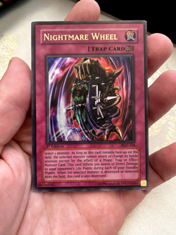 Yugioh Nightmare Wheel PGD-106 Ultra Rare 1st Edition MP - Image 1
