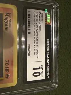 “CGC 10 GEM MINT Magmar Holo 006/034 Charizard & Ho-Oh ex Pokemon Card” - Image 2