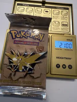 1999 Pokemon Unlimited Fossil New Hang Tag Sealed Booster Pack 21.0g - Image 1