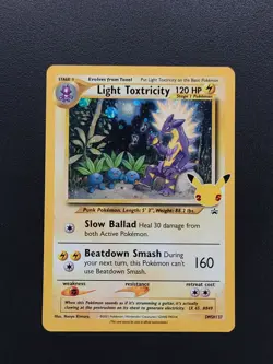 Light Toxtricity SWSH137 Celebrations Promo HOLO SWIRL Pokemon TCG Card NM - Image 1