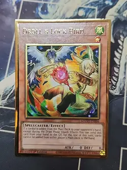 Droll & Lock Bird Mago-En006 Maximum Gold 1st Edition Yu-Gi-Oh Card - Image 1