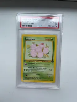 1999 Pokemon Jungle Exeggcute 52/64 1st Edition Non-Holo Card PSA 10 GEM MINT - Image 1